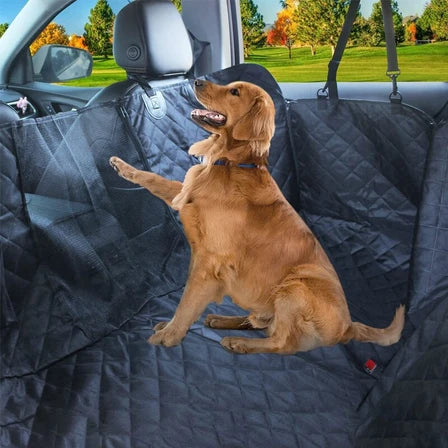 Golden retriever sitting on a waterproof car seat cover in a vehicle, showcasing comfort and protection for pets.