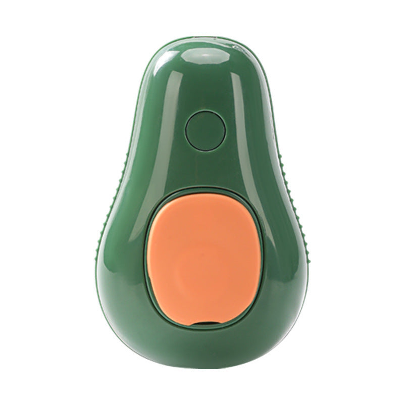 Green avocado-shaped pet grooming tool for removing loose hair and dander.